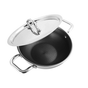 Stainless steel wok with lid on a white background
